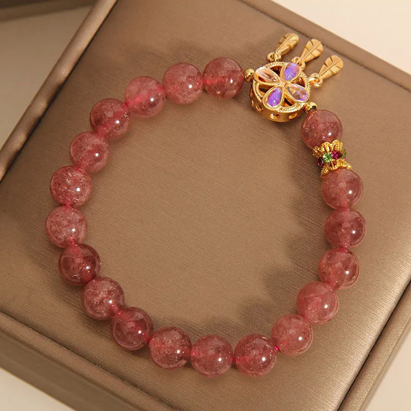 Natural strawberry quartz bracelet with four-leaf clover dream catcher ball pendant on adjustable string