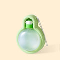 Green portable dog water bottle with pull-out drinking bowl, showing leak-proof design for travel.