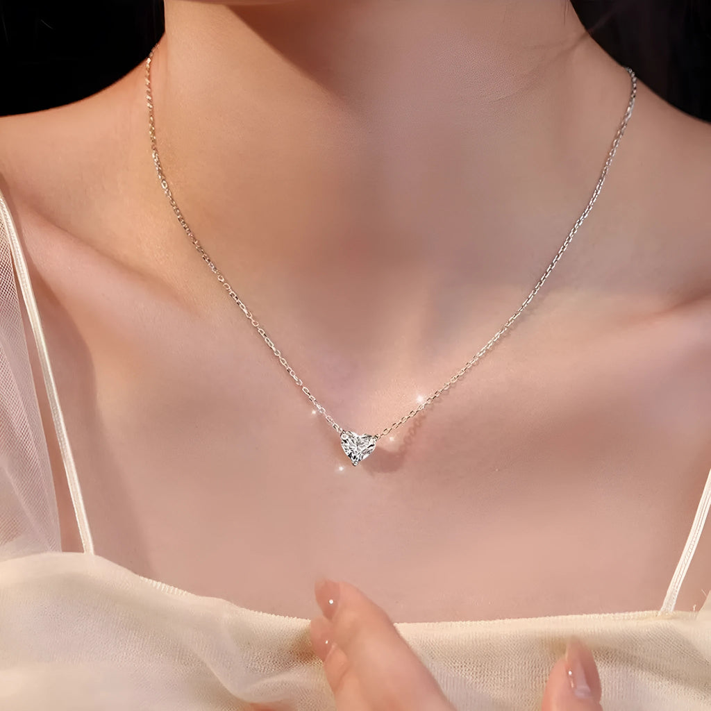 Women's minimalist heart necklace in silver tone with copper construction