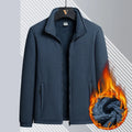 Men's grey Berber fleece coat with a stand-up collar and front zip, shown in a loose fit.