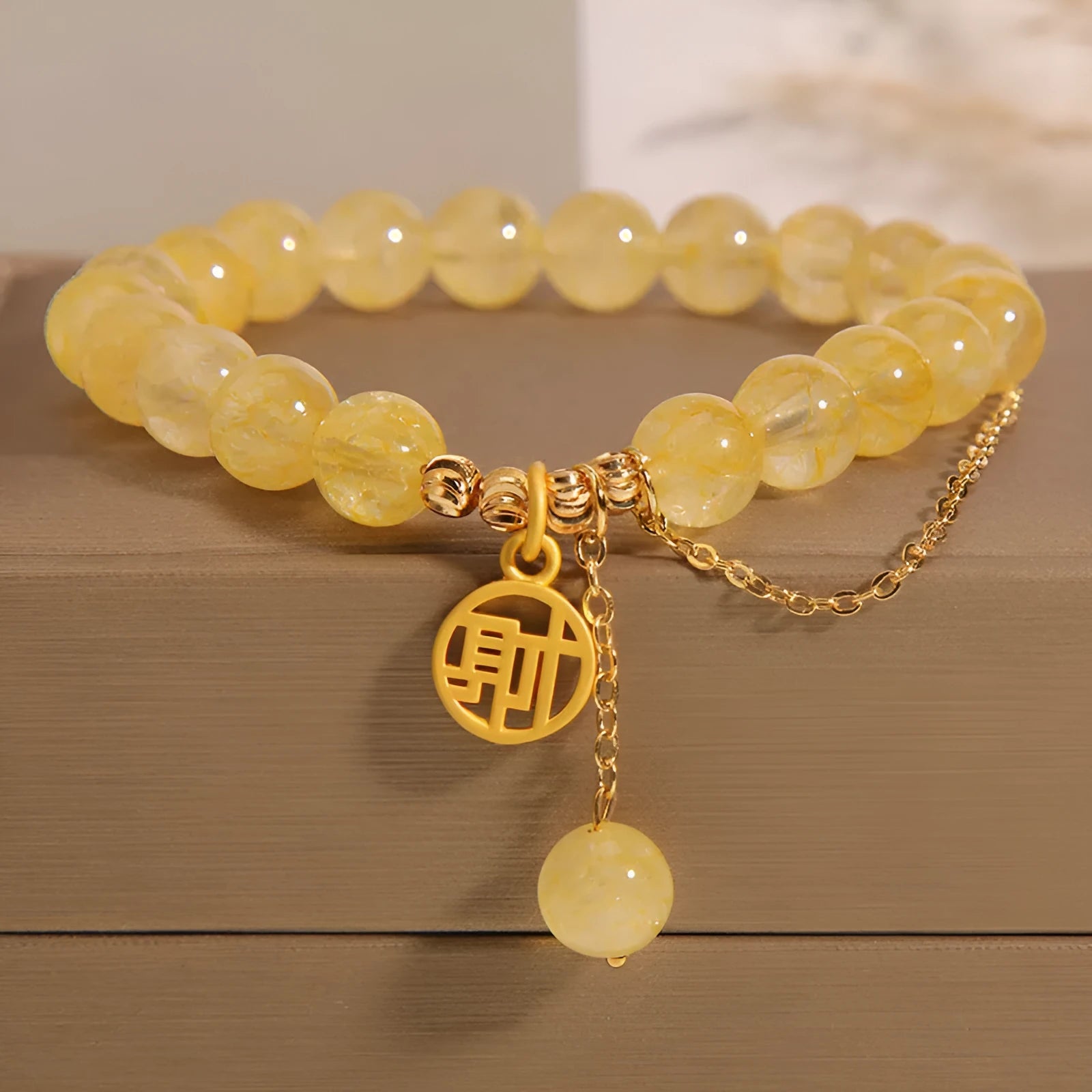 Natural stone citrine bracelet with electroplated metal and Chinese character charm on tassel for women