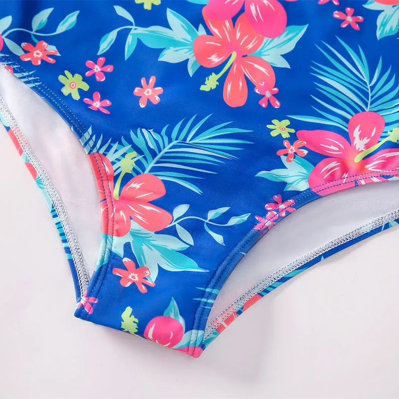 Girl's long-sleeve one-piece swimming suit in polyester fabric, briefs style, multiple colour options, sizes 100-150cm