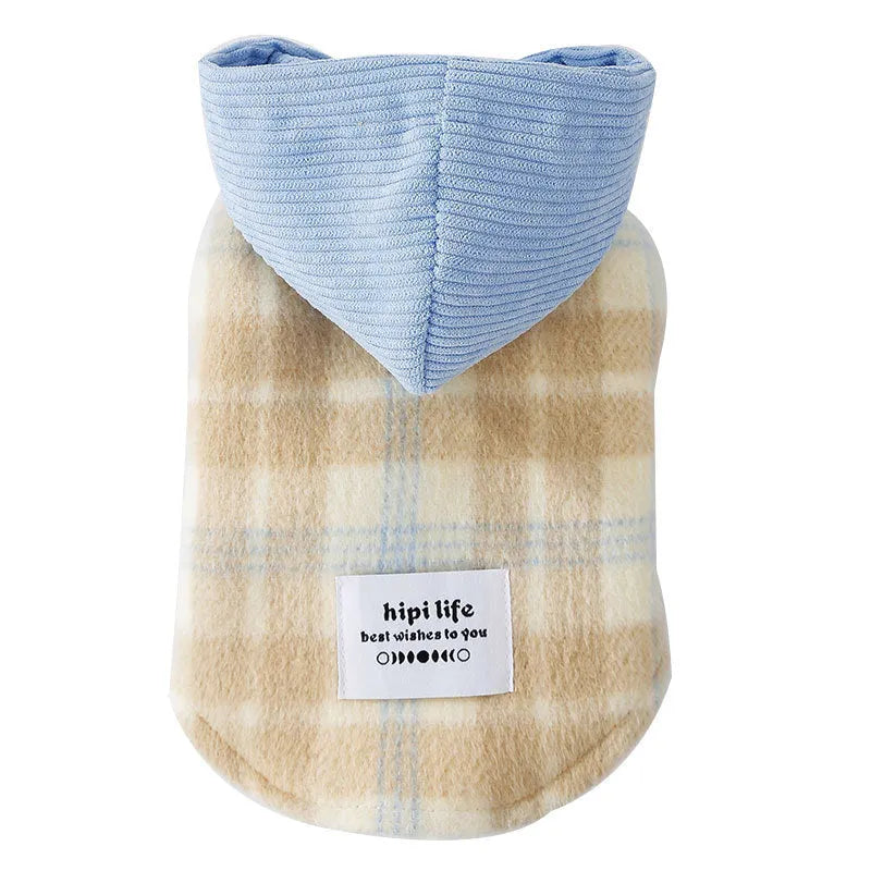 Blue corduroy chessboard grid pattern hooded vest for a dog on a neutral background