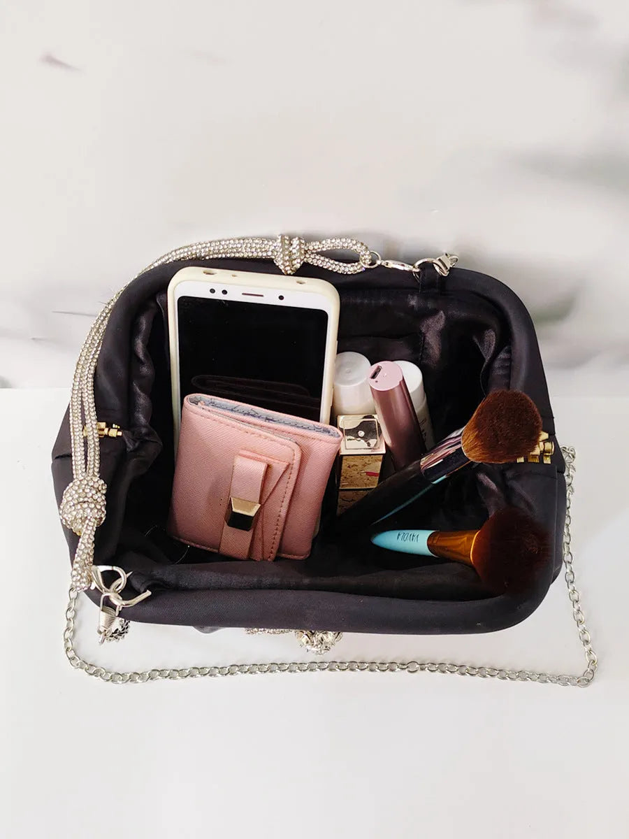 Women's soft polyester crossbody messenger bag in shell shape with chain details and document compartment