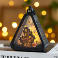 Halloween pumpkin lantern decoration with battery-powered light in one of four colour designs