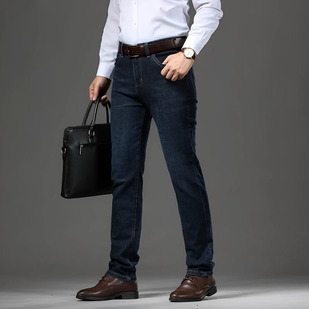 Man wearing black high-elasticity loose-fit straight-leg jeans, business casual style