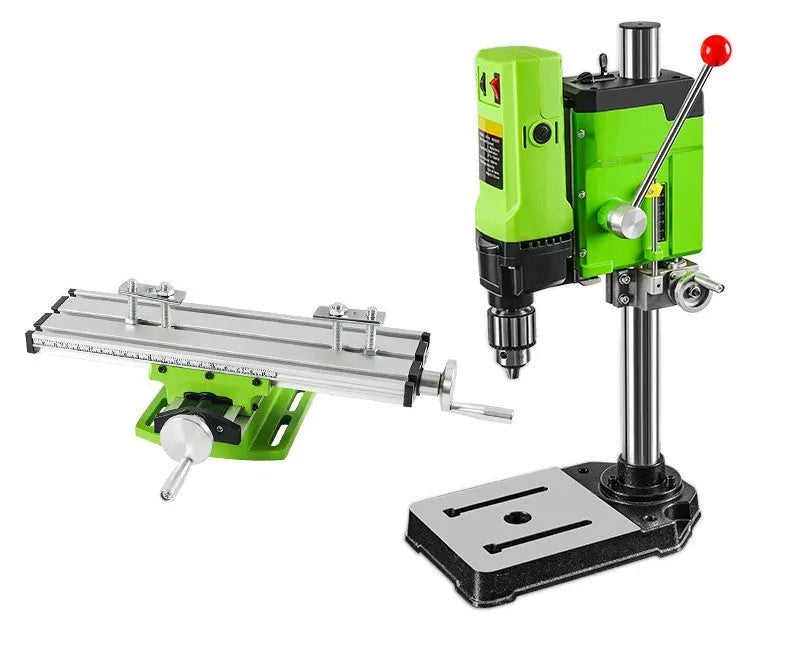 Bench drill and milling machine with cross bench pliers on workbench