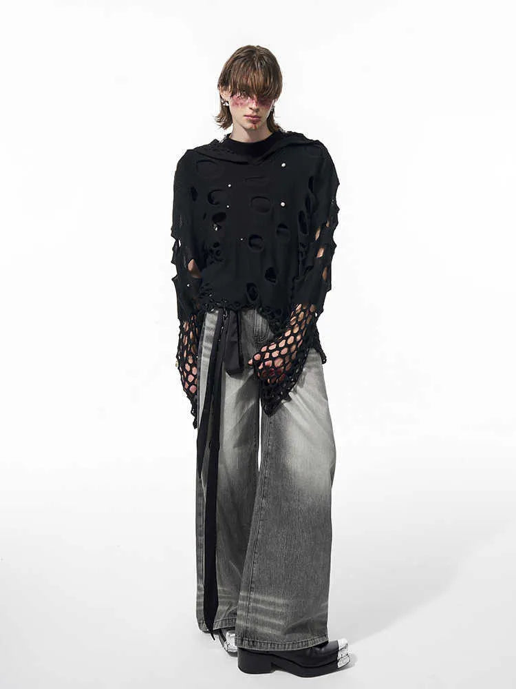 Men's loose fit black hooded sweater with pearl decoration on the front.