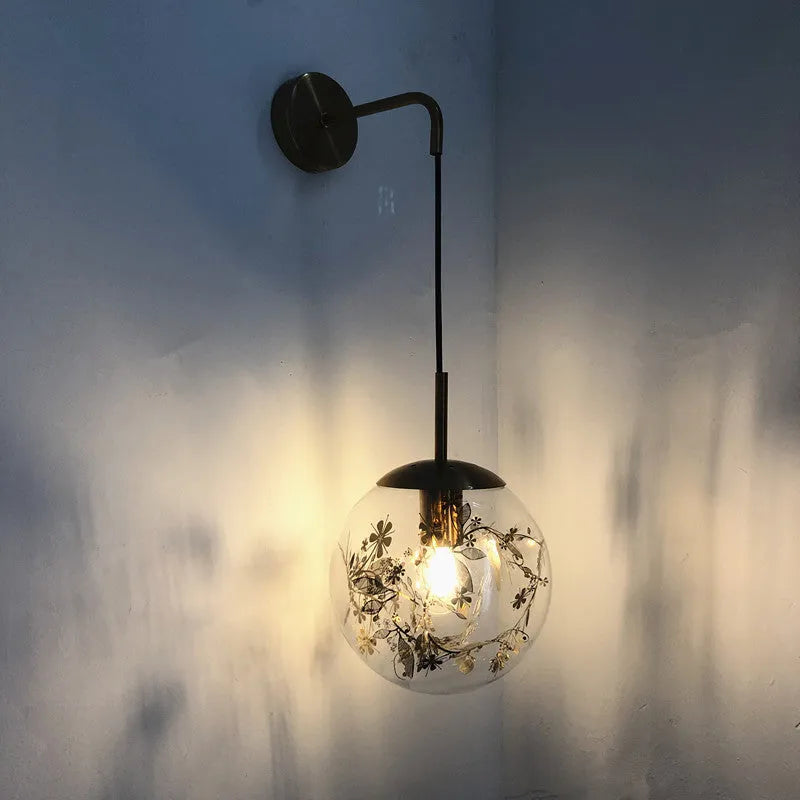 Modern glass bedside wall lamp in golden flower finish with 20cm diameter