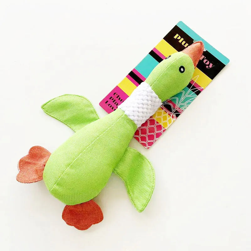 Blue duck-shaped plush dog toy with squeakers for chewing play measuring 33cm long