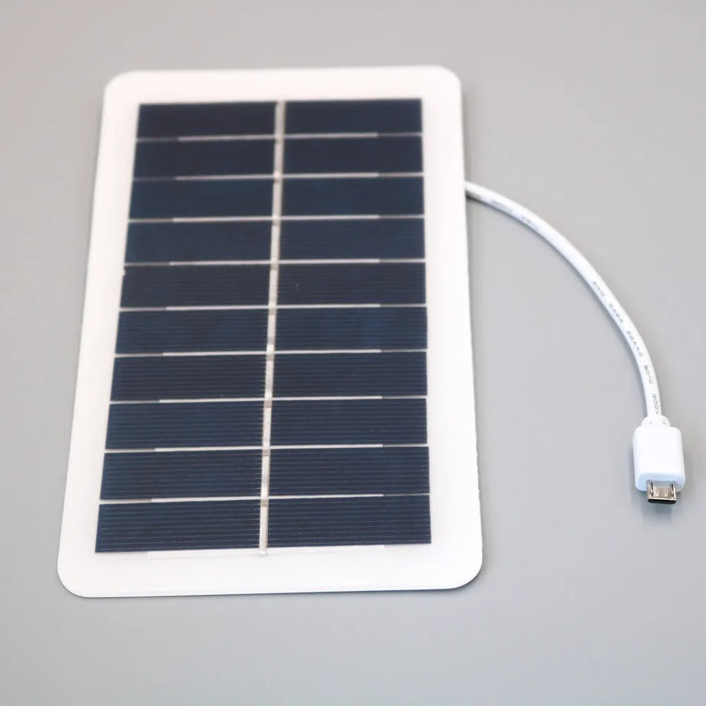 Black portable solar panel mobile phone charger with USB output and PET grinding treatment