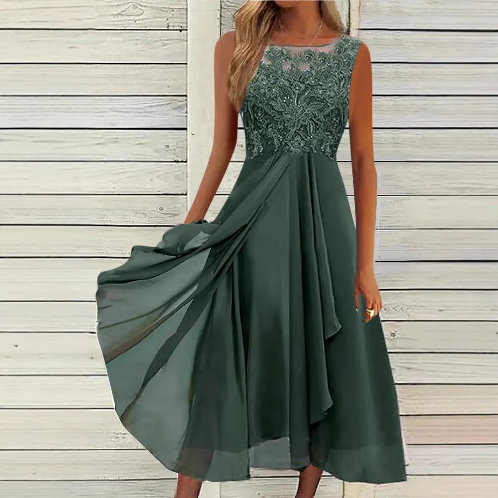 Women's sleeveless green chiffon dress with lace detailing and a mid-length skirt.