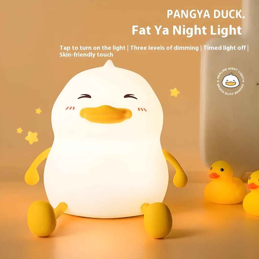 Chubby night light desk lamp with silicone phone holder surface showing three brightness settings