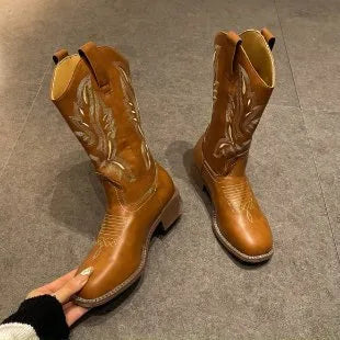 Brown women's embroidered mid-calf Martin boots on a white background, showing round toe and low square heel.