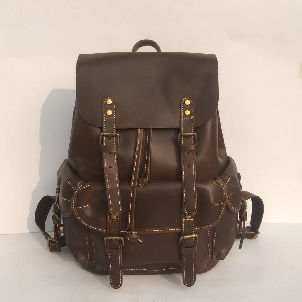Men's genuine top layer cowhide leather backpack in coffee brown with air pillow belt, front view