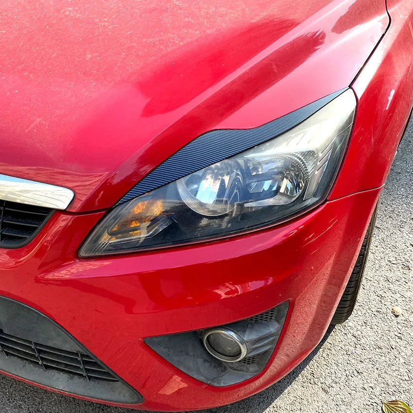 Ford Focus front headlight with carbon fibre pattern ABS eyelid sticker trim applied