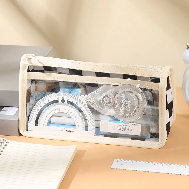 Transparent PVC pencil case with chessboard pattern showing writing instruments inside