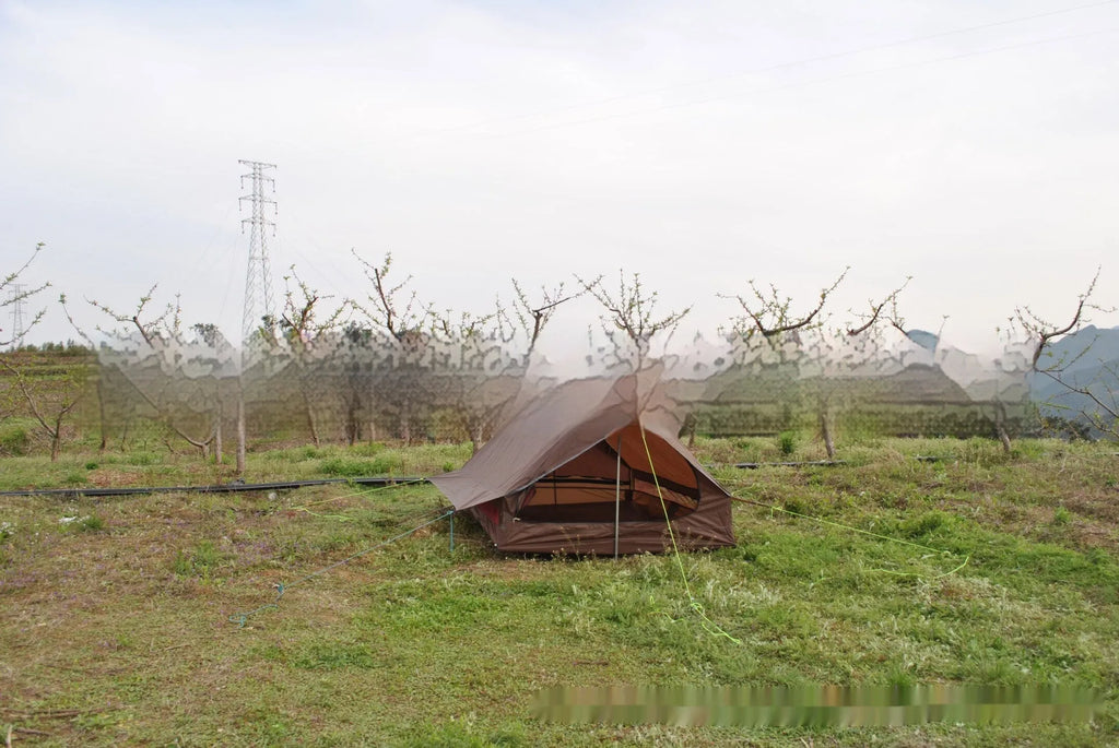 Brown or white A-line pole-free tent pitched with hiking canes showing 210x150x110cm dimensions