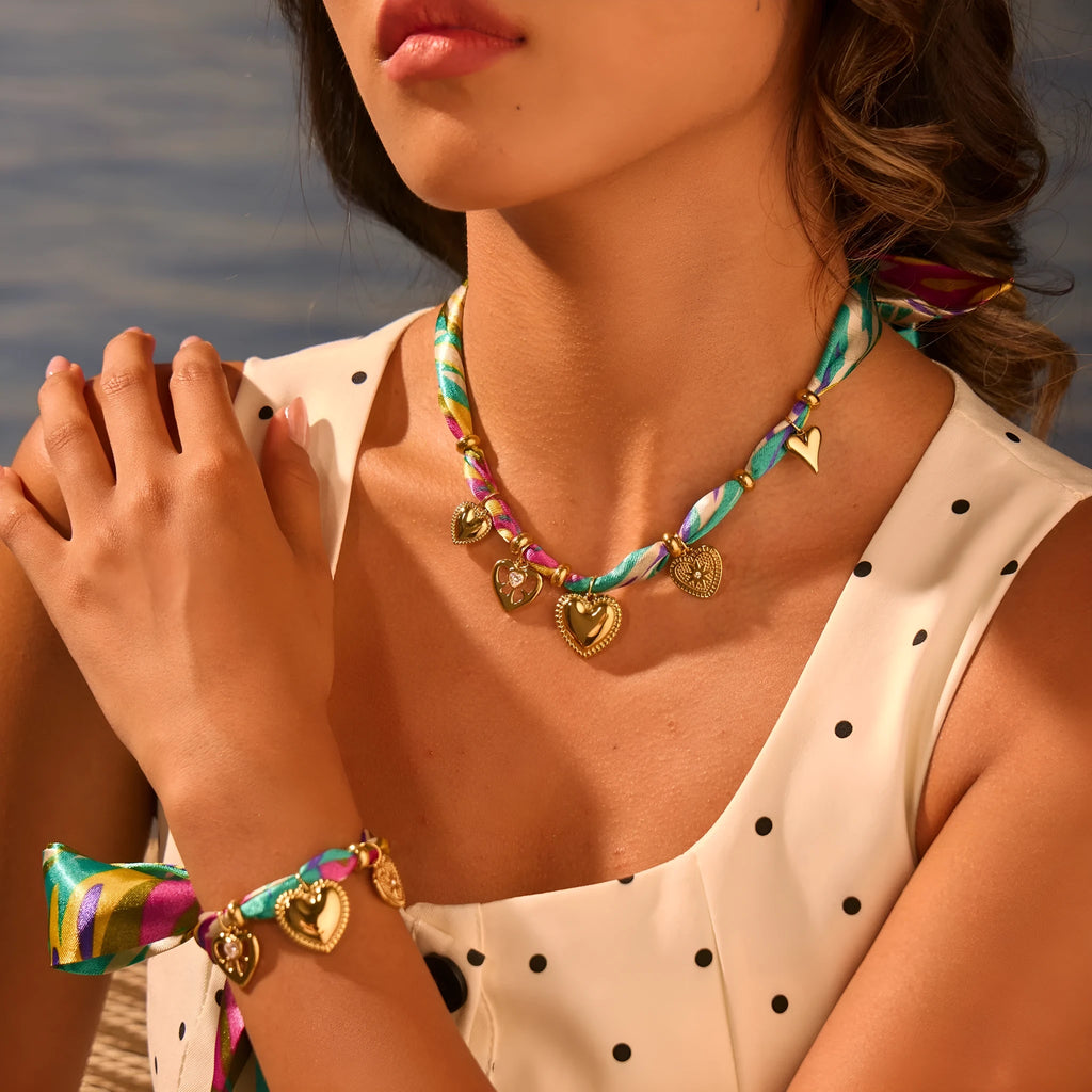 Women's stainless steel geometric pendant necklace and bracelet set with 18K plating