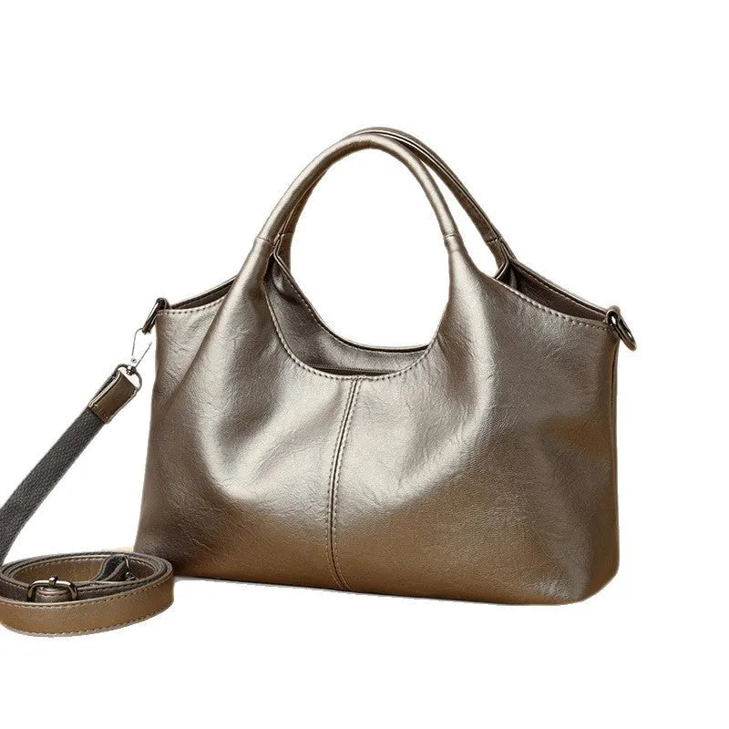 Women's genuine leather large capacity crossbody bag in beige with soft texture and polyester lining