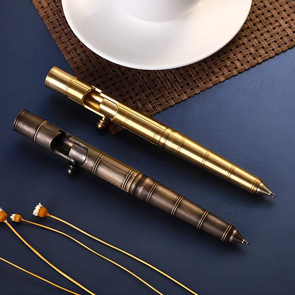 Retro brass tactical pen with bolt-action press mechanism and brushed finish.