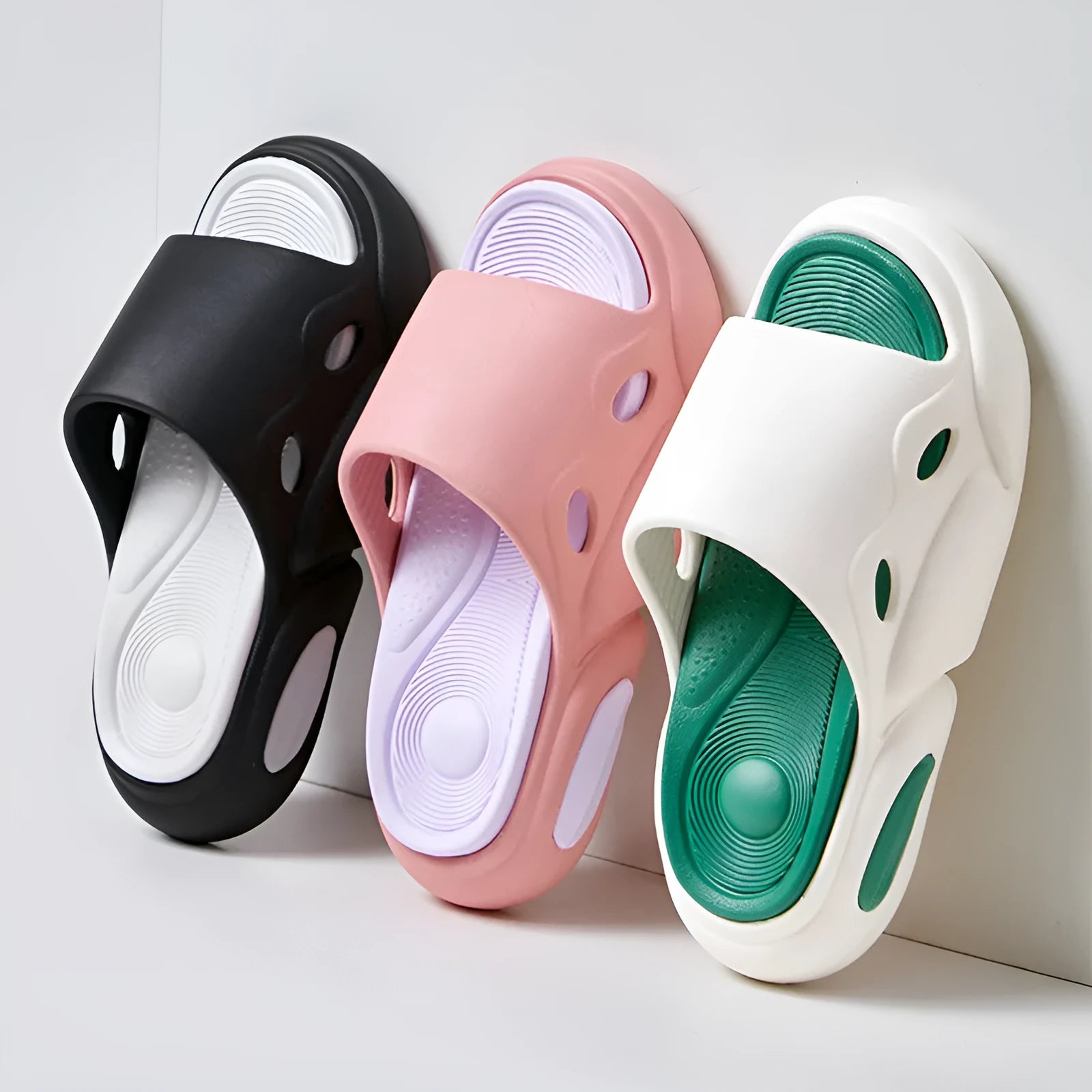 Women's two-colour EVA slippers with a thick sole and leather lining.