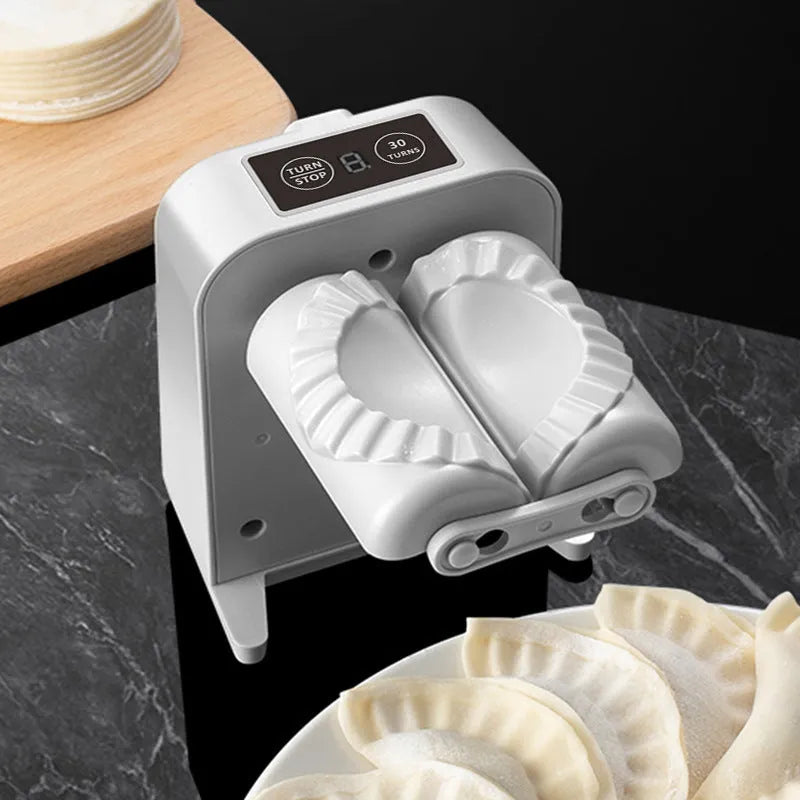 White electric automatic dumpling maker machine with USB power cord and accessories