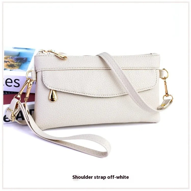 Simple soft surface PU crossbody shoulder bag in horizontal square shape with sandwich zipper compartment, multiple colour options available.