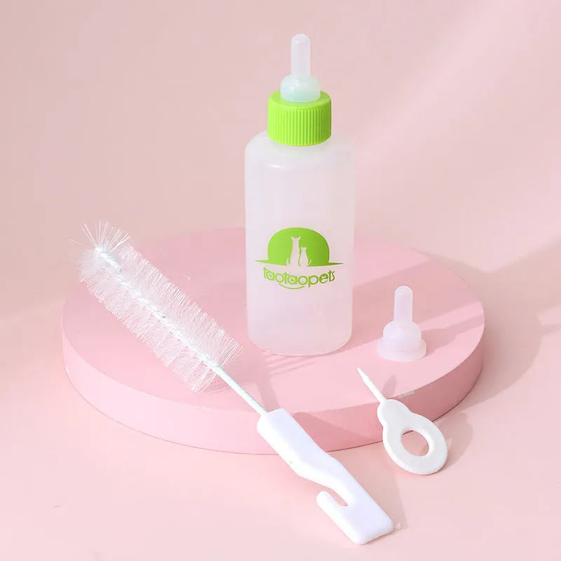 Four pet milk bottles in yellow, pink, blue, and green with cleaning brush on light background