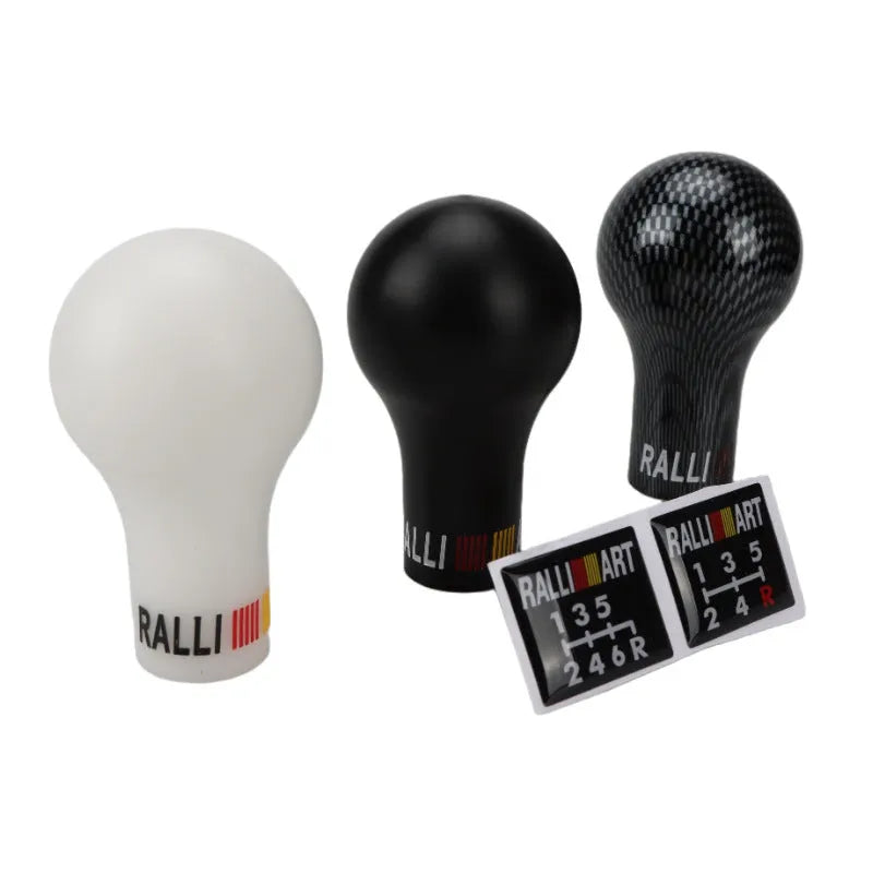 Mitsubishi car gear knob in five colour options including carbon fibre black and bright blue