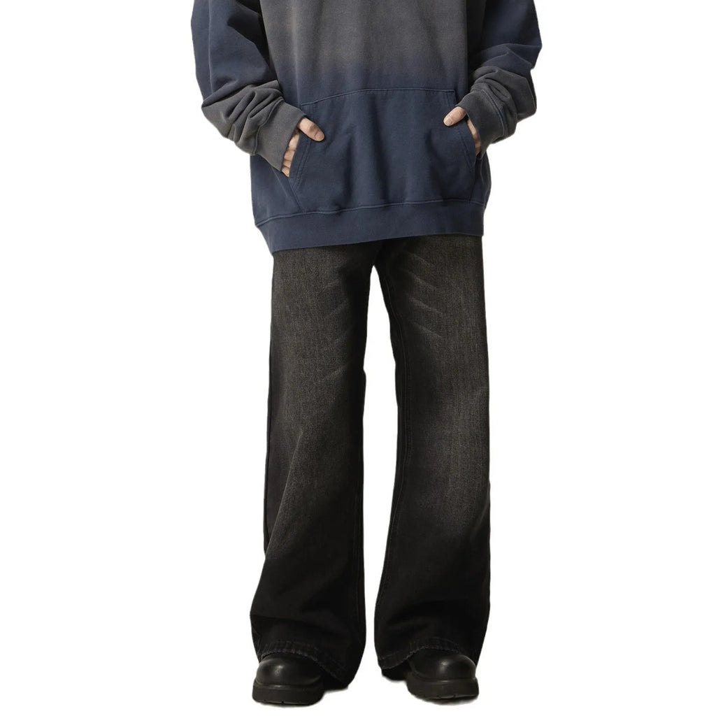 Men's black loose straight jeans with retro styling and zipper fly