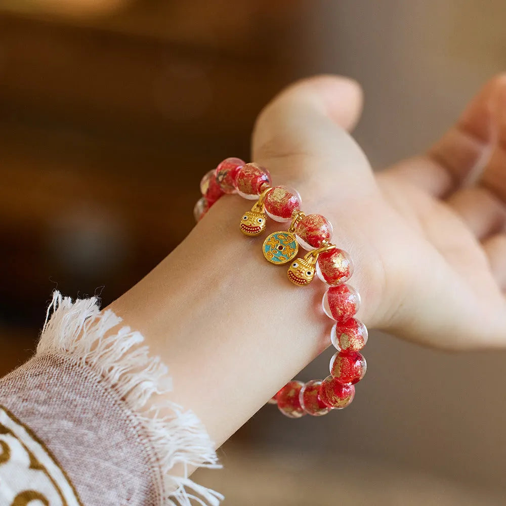 Handmade coloured glaze bracelet with gold foil swallowing gold beast motif, fragrant grey tone, geometric shape, unisex Chinese national style