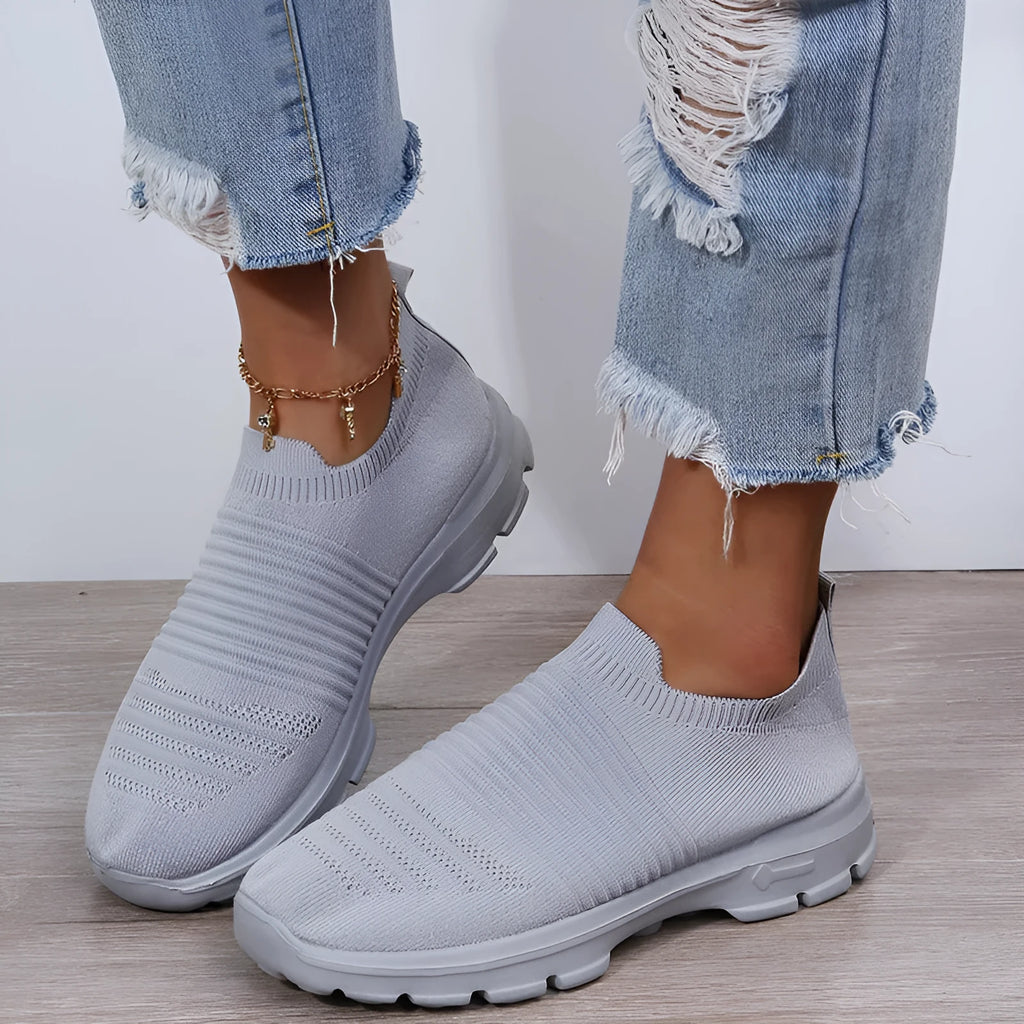 Women's knit sock shoes in beige with breathable upper, round toe, and low rubber sole