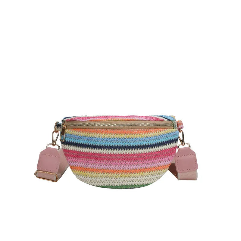 Blue bohemian style straw beach bag with single shoulder strap and shell shape design