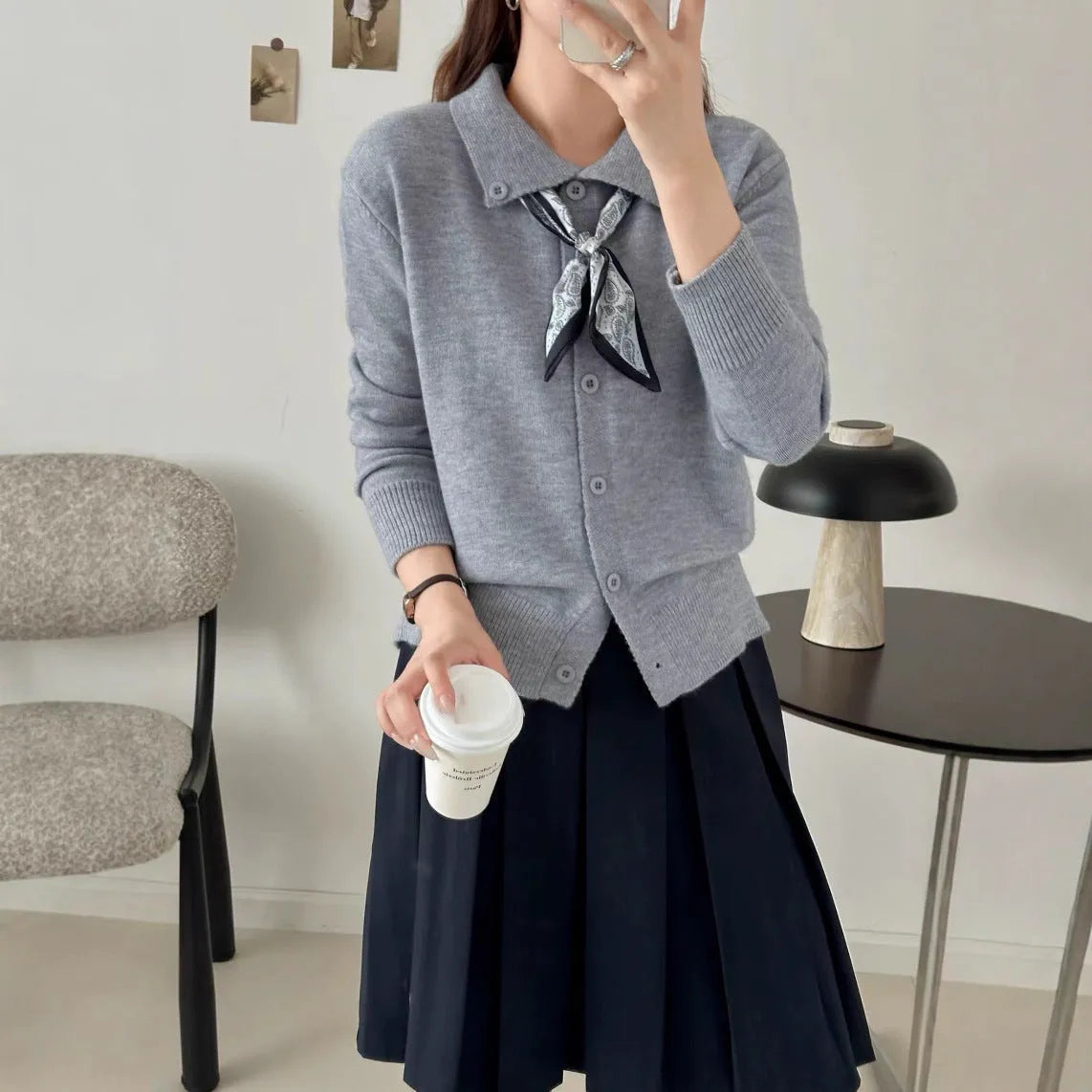 Beige acrylic knit cardigan with lapel scarf collar design, long sleeves and cardigan styling