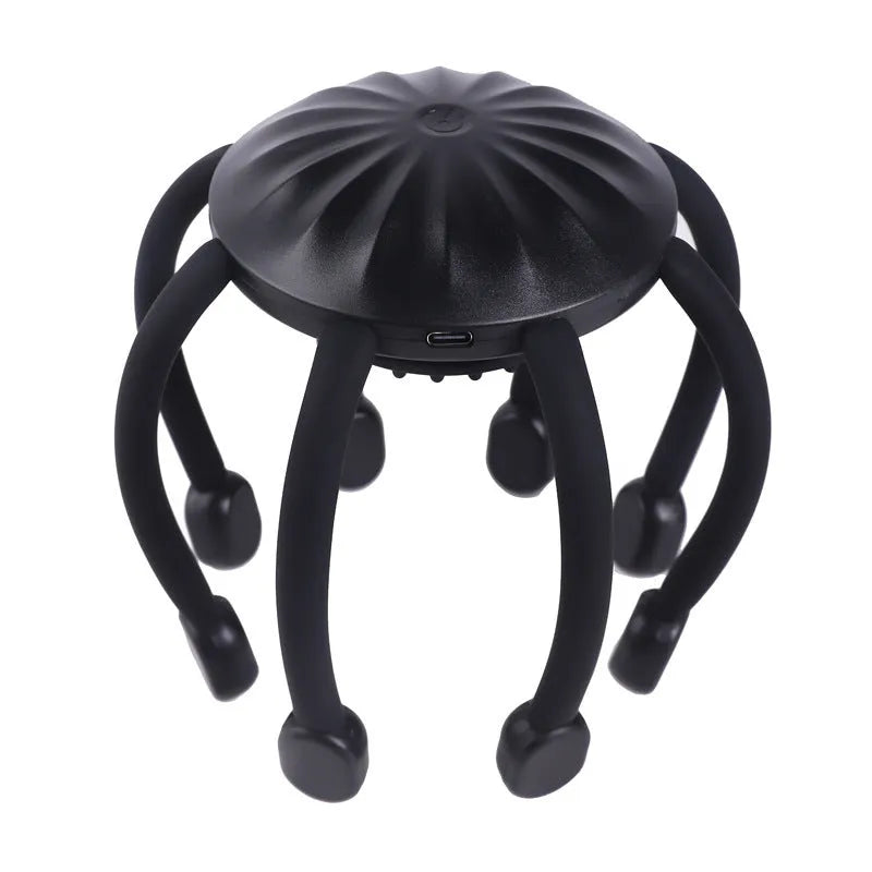 Black handheld electric scalp massager with multiple flexible silicone claws vibrating on a scalp.