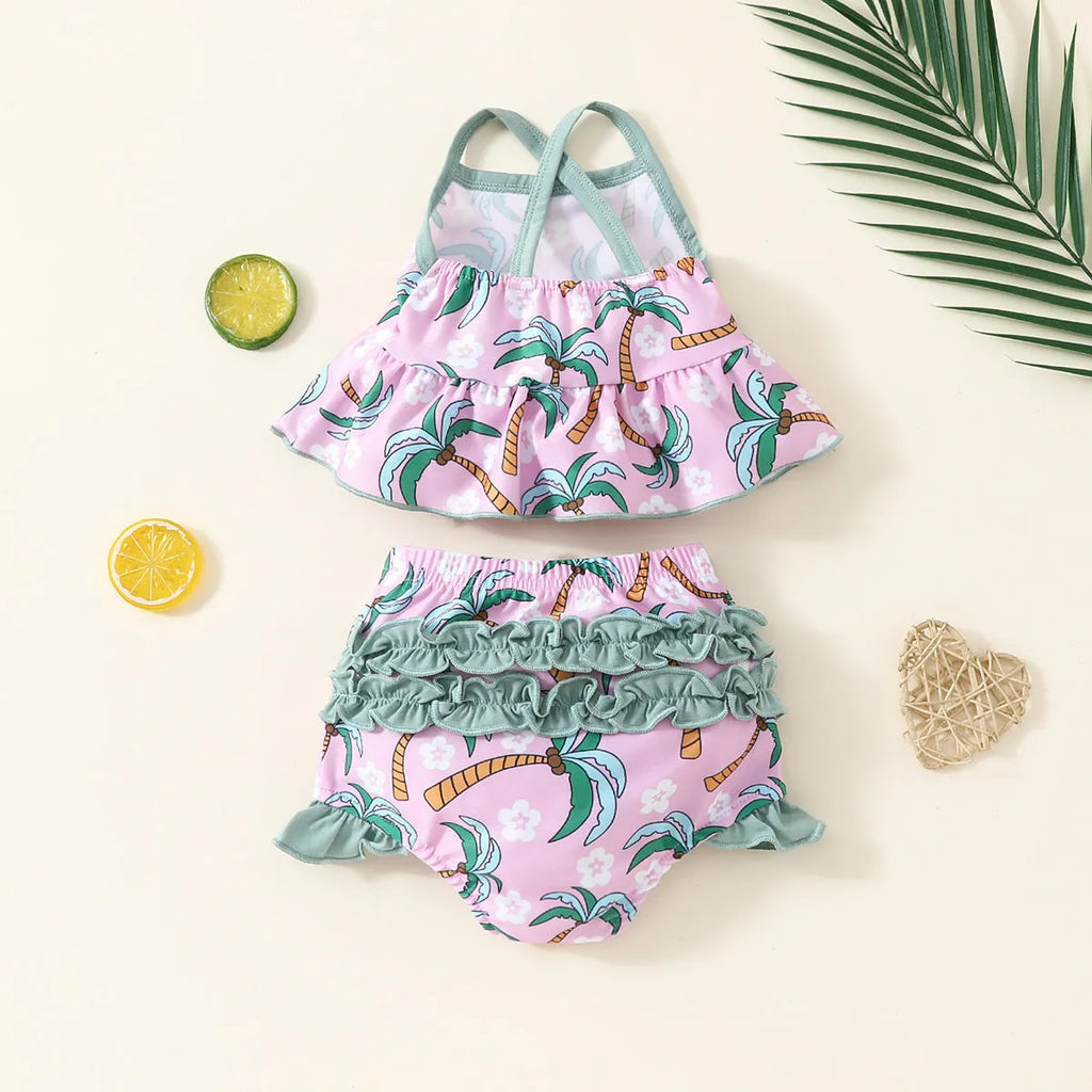 White children's two-piece swimsuit set with shirt and shorts on hanger