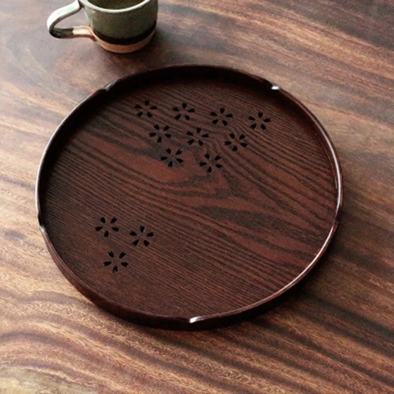 Wooden shallow plate with cherry blossom cut-out design, 30cm diameter.