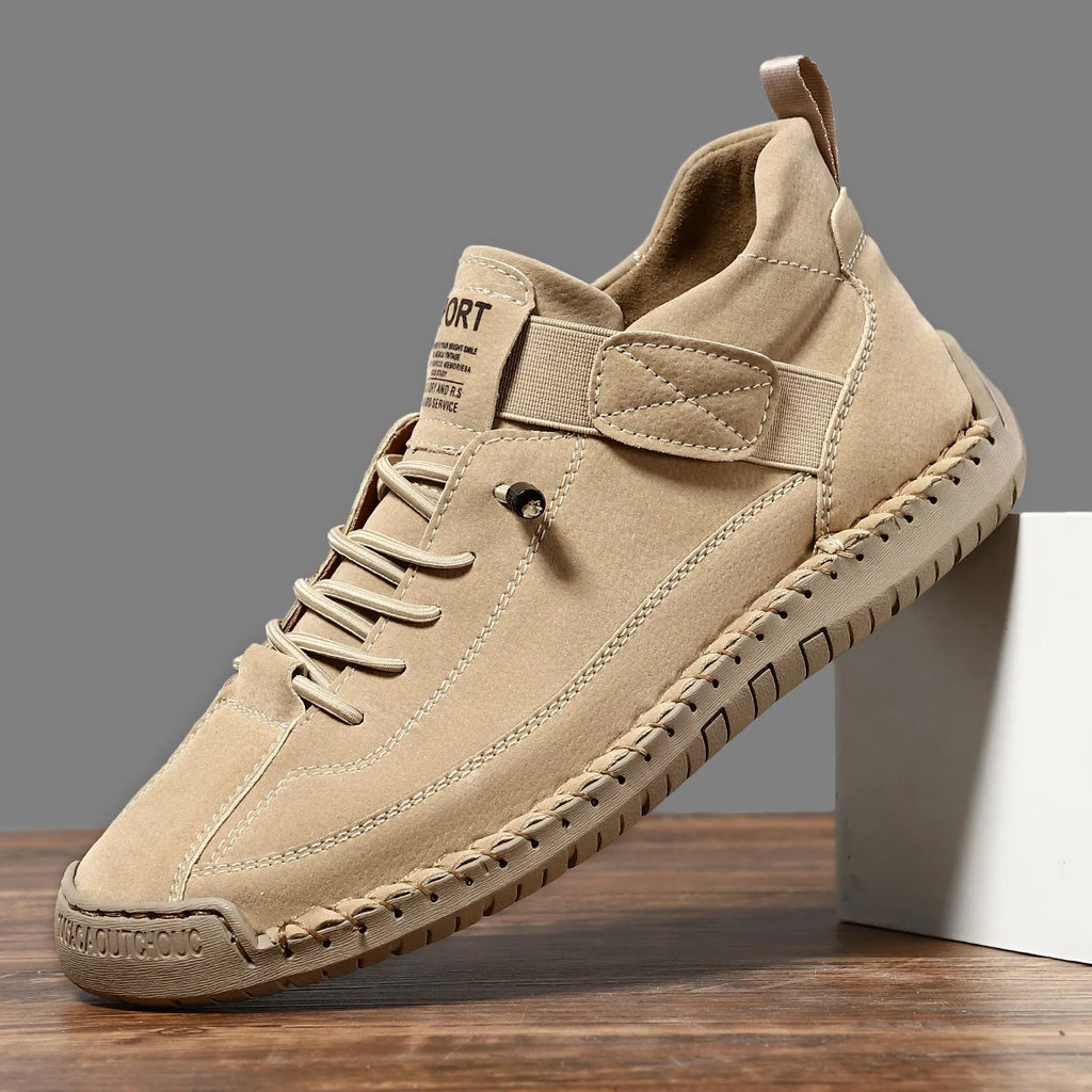 Men's mid-top Martin boot in a solid colour with elastic band and tooling stitching detail.