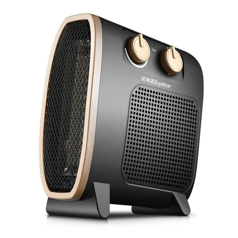 Small white electric heater fan with mechanical controls on a wooden floor