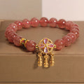 Natural strawberry quartz bracelet with four-leaf clover dream catcher ball pendant on adjustable string