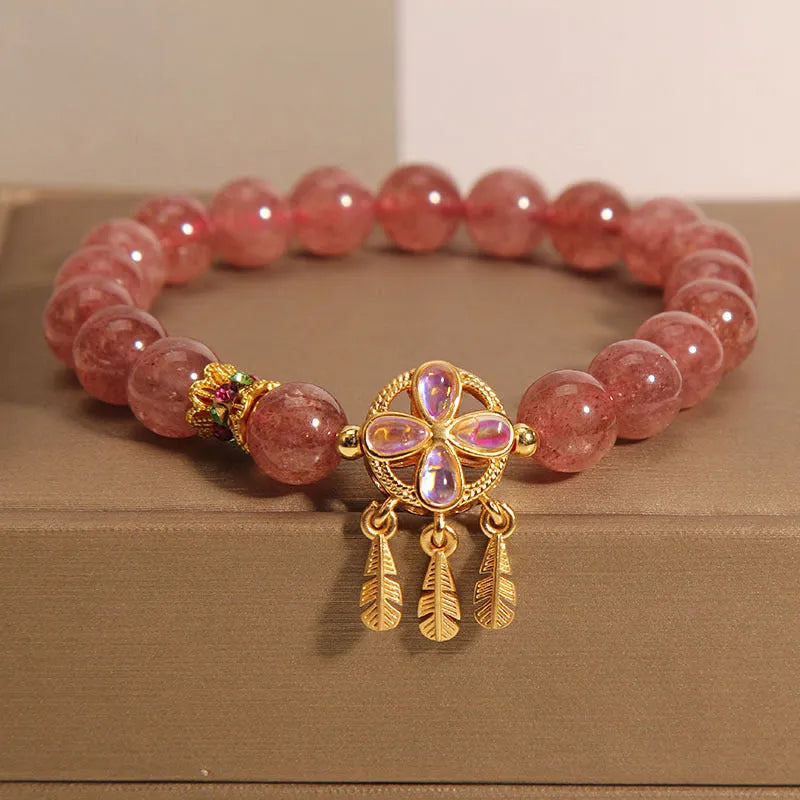 Natural strawberry quartz bracelet with four-leaf clover dream catcher ball pendant on adjustable string