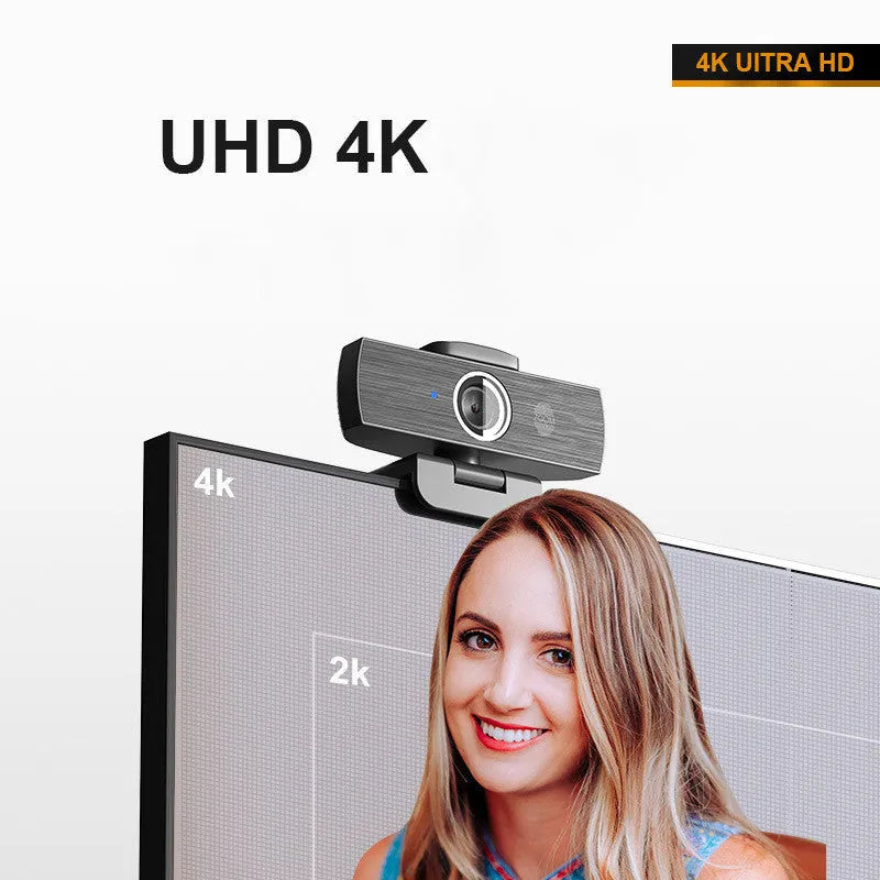 Black computer webcam with 4K resolution and magnetic privacy cover attached