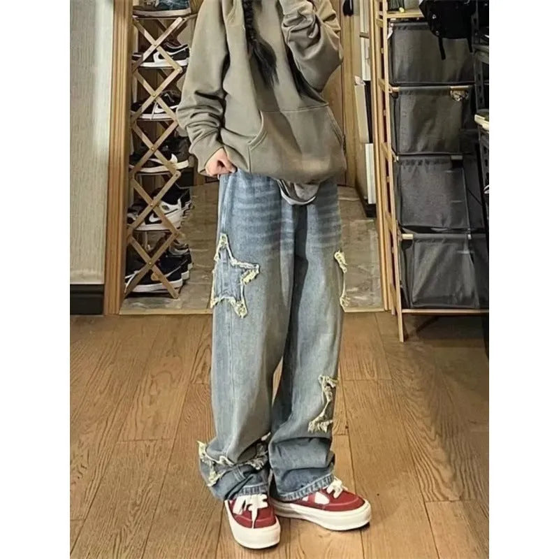 Blue high-waist women's jeans with a wide-leg straight cut on a mannequin.