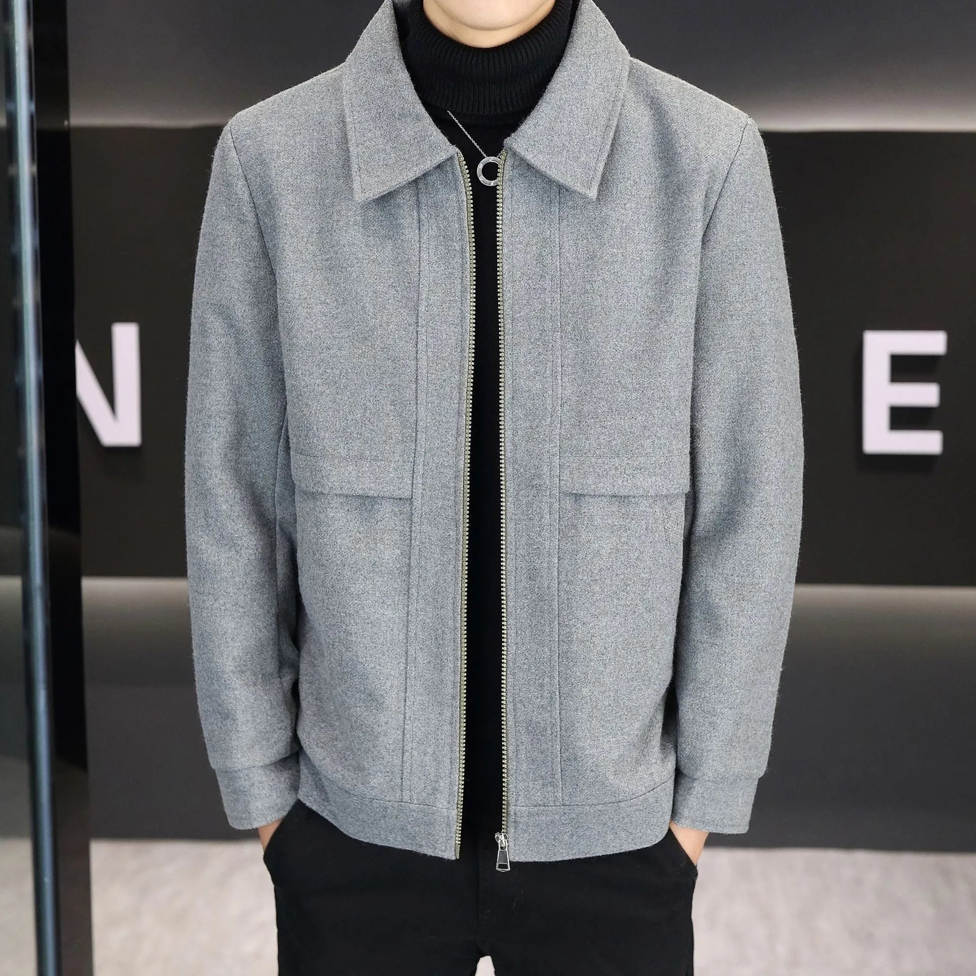 East Season khaki casual jacket with a polo collar and side seam pockets on a model.