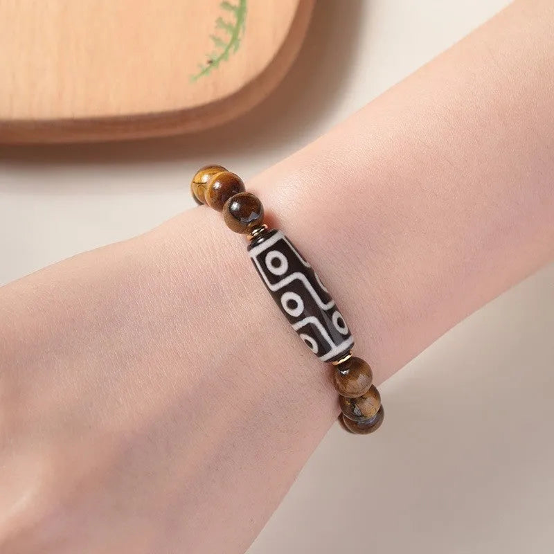 Tigereye Buddha bracelet with single circle design and natural Dzi bead in ethnic style