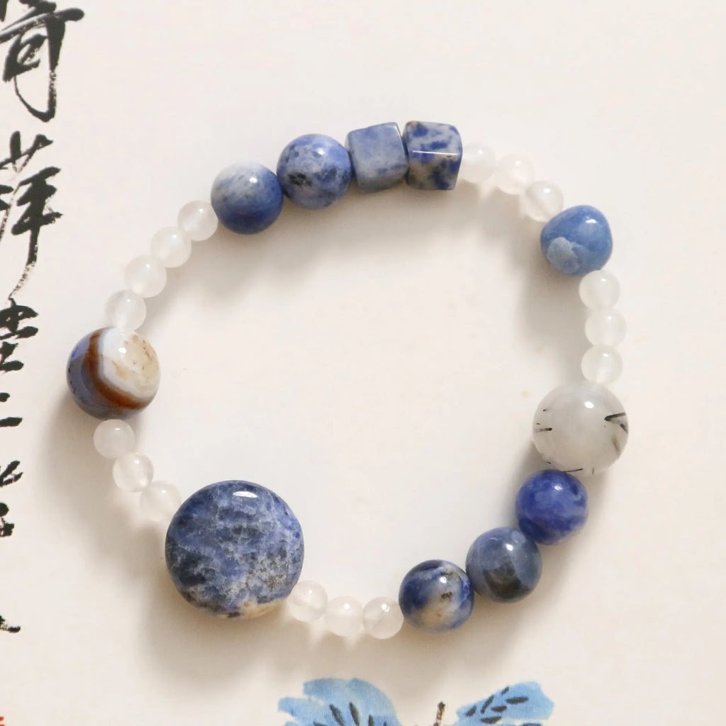 Natural blue point stone and black hair crystal agate hand-woven unisex bracelet with round and oval geometric beads