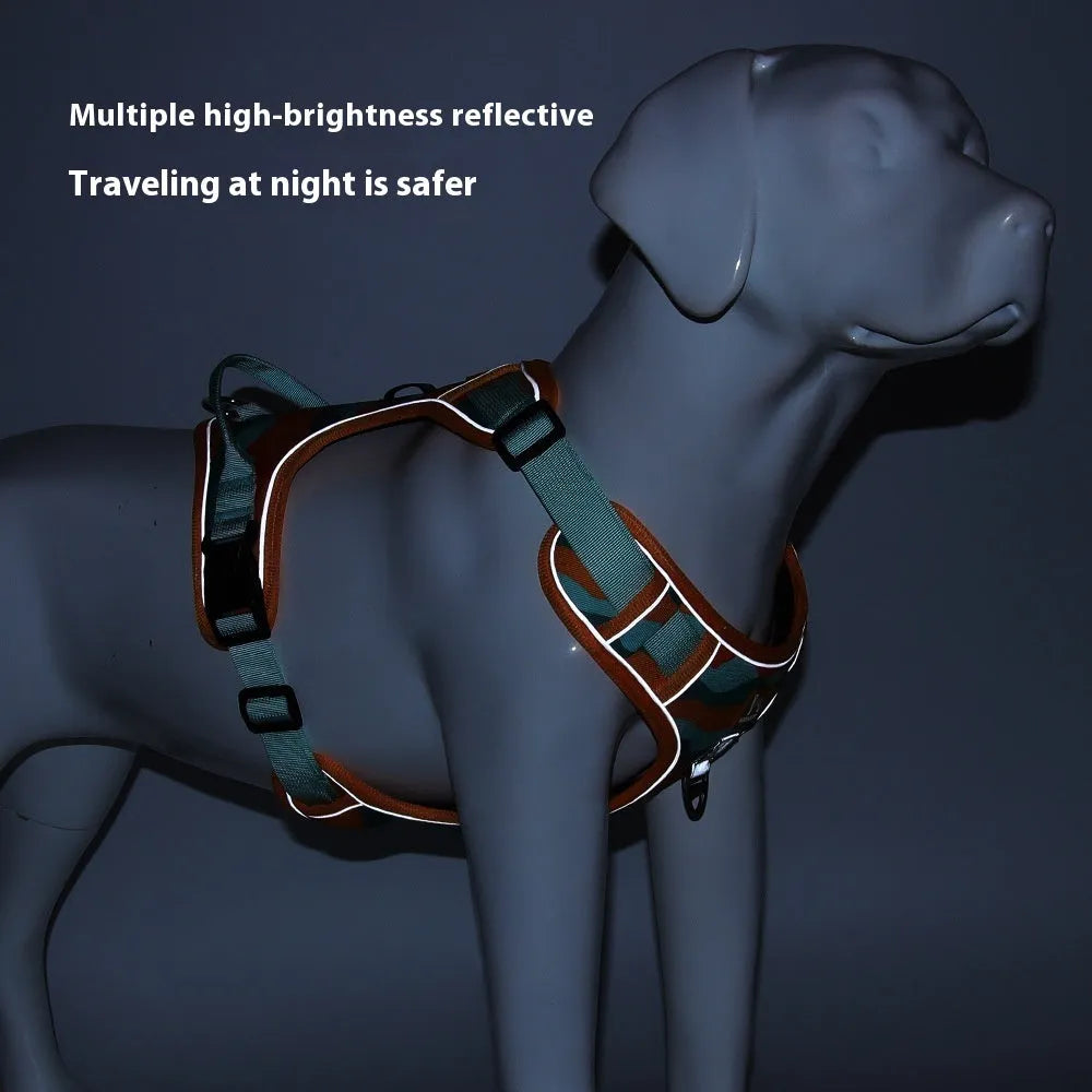 Orange reflective dog harness with chest and back straps and a hand-holding rope clip.