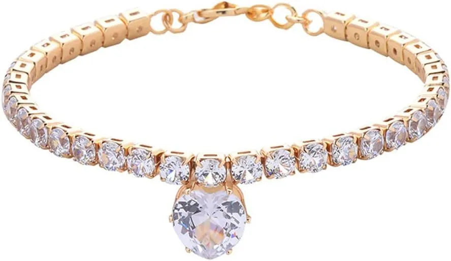Gold rhinestone heart-shaped decorative collar for a dog or cat, shown with a bling design and an extension chain.