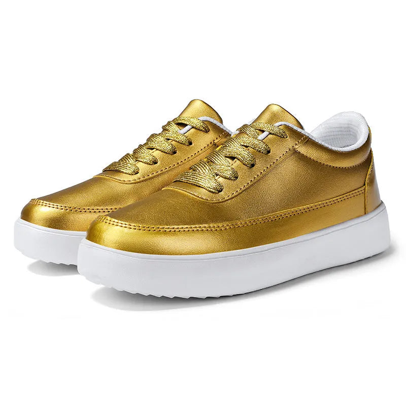 Women's white leather lace-up flat casual shoes shown from the side.